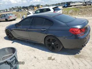 2015 BMW M6 z VIN WBS6C9C52FD468030, wystawiony jako Copart lot #70863134 z przebiegiem 66 839 mil mil oraz Szkoda całkowita • Salvage title. Historia ofert i sprzedaży dostępna na DreamBid. Obrazek 2.