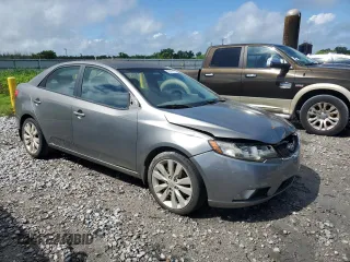2010 Kia Forte SX с VIN KNAFW4A31A5242306, выставлен на аукционе Copart как лот 56427975 с пробегом 131 119 миль миль и Чистый • Clean title. История ставок и продаж доступна на DreamBid. Изображение 4.