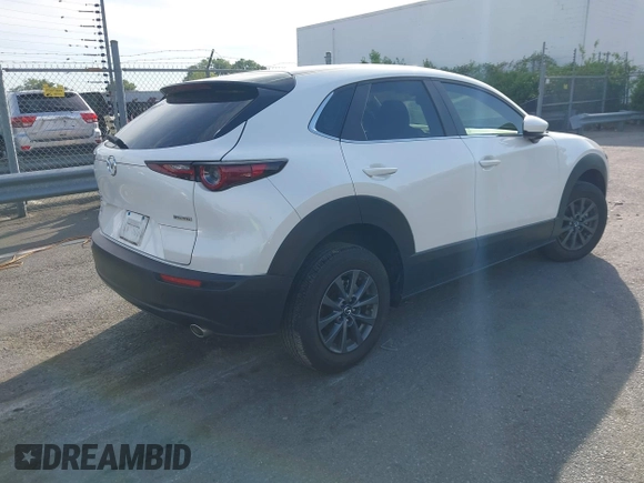 2023 Mazda CX-30 S with VIN 3MVDMBAM8PM545288, listed as a IAAI auction lot 42198433 with 19,609 mi miles and . Bid and sale history available at DreamBid. Image 4.