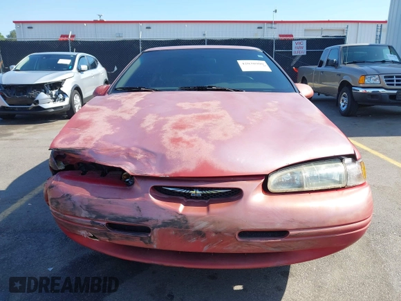 1996 Ford Thunderbird LX z VIN 1FALP62W0TH142986, wystawiony jako IAAI lot #42030900 z przebiegiem 168 993 mil mil oraz . Historia ofert i sprzedaży dostępna na DreamBid. Obrazek 12.