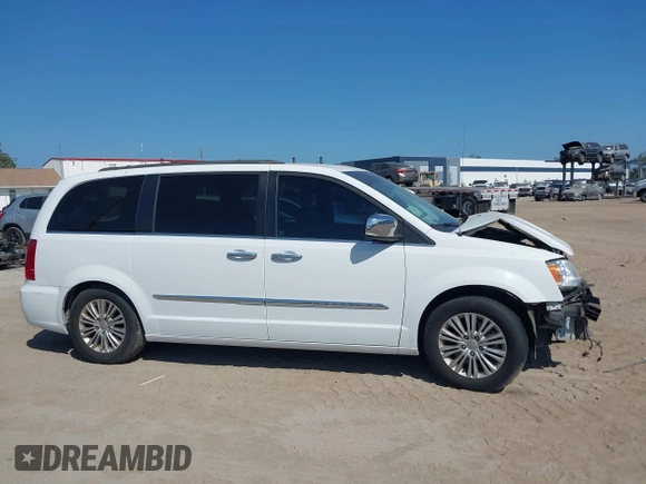 2015 Chrysler Town & Country Touring L with VIN 2C4RC1CG9FR547098, listed as a IAAI auction lot 42135624 with 61,364 mi miles and . Bid and sale history available at DreamBid. Image 14.