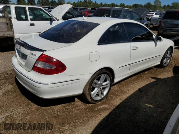 2009 Mercedes-Benz CLK-Class 3.5L with VIN WDBTJ56H09F261819, listed as a Copart auction lot 70021184 with 130,976 mi miles and Salvage Title. Bid and sale history available at carsss.com. Image 3.