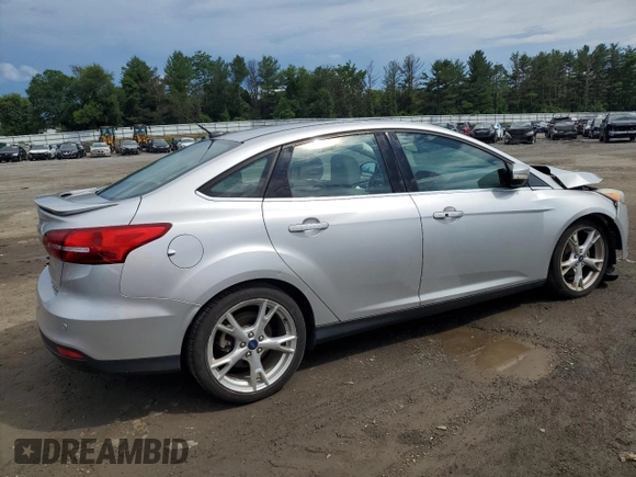 2015 Ford Focus Titanium with VIN 1FADP3J27FL285842, listed as a Copart auction lot 61159935 with 79,215 mi miles and Salvage title. Bid and sale history available at DreamBid. Image 3.
