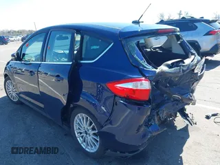 2016 Ford C-Max Energi SEL with VIN 1FADP5CU9GL102758, listed as a IAAI auction lot 41989630 with 103,410 mi miles. Bid and sale history available at carsss.com. Image 3.