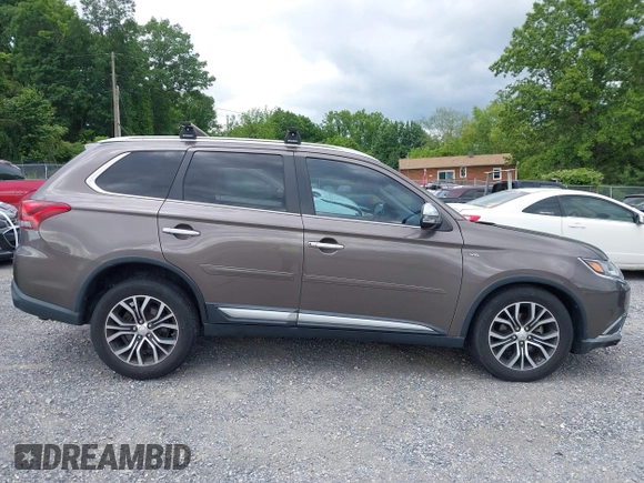 2016 Mitsubishi Outlander GT z VIN JA4JZ4AXXGZ002867, wystawiony jako IAAI lot #42327299 z przebiegiem 85 538 mil mil oraz . Historia ofert i sprzedaży dostępna na DreamBid. Obrazek 13.