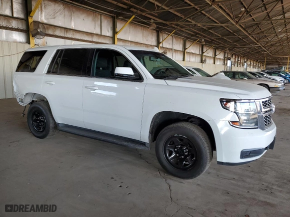 2016 Chevrolet Tahoe Commercial with VIN 1GNLCDEC9GR145324, listed as a Copart auction lot 83371894 with 106,390 mi miles and Salvage Title. Bid and sale history available at carsss.com. Image 4.