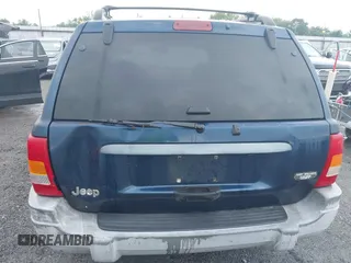 2000 Jeep Grand Cherokee Laredo with VIN 1J4G248S4YC144404, listed as a IAAI auction lot 42114635 with 181,854 mi miles and . Bid and sale history available at DreamBid. Image 12.