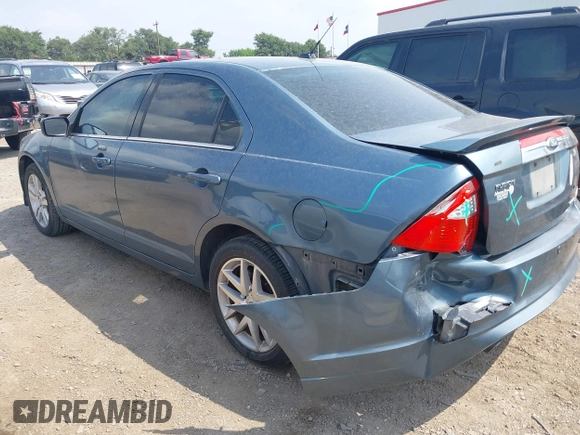 2012 Ford Fusion SEL z VIN 3FAHP0JG3CR286320, wystawiony jako IAAI lot #42159555 z przebiegiem 184 128 mil mil oraz . Historia ofert i sprzedaży dostępna na DreamBid. Obrazek 3.