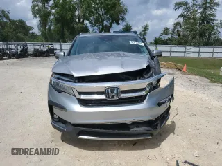 2021 Honda Pilot Touring 8-Passenger with VIN 5FNYF6H90MB079698, listed as a Copart auction lot 52011005 with 90,331 mi miles and Non repairable. Bid and sale history available at DreamBid. Image 5.