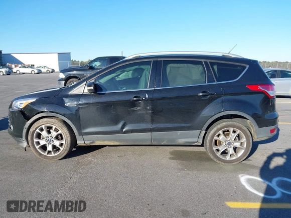 2016 Ford Escape Titanium with VIN 1FMCU0JX3GUA90420, listed as a IAAI auction lot 41850537 with 115,770 mi miles. Bid and sale history available at carsss.com. Image 14.