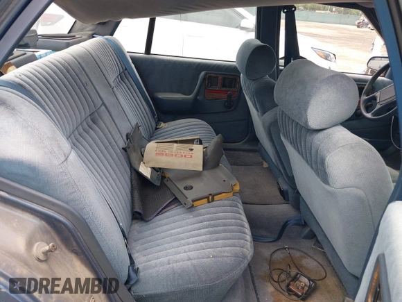 1990 Pontiac Bonneville z VIN 1G2HX54C6L1204370, wystawiony jako IAAI lot #42283309 z przebiegiem 114 427 mil mil oraz . Historia ofert i sprzedaży dostępna na DreamBid. Obrazek 8.