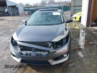 2018 Honda Civic EX-L z VIN JHMFC1F85JX014701, wystawiony jako IAAI lot #41467342 z przebiegiem 50 292 mil mil oraz . Historia ofert i sprzedaży dostępna na DreamBid. Obrazek 6.