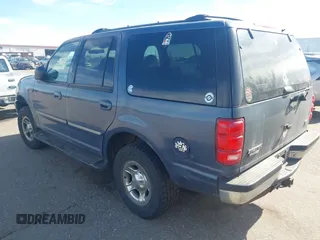 1999 Ford Expedition XLT z VIN 1FMPU18L2XLB43236, wystawiony jako IAAI lot #41792317 z przebiegiem 157 636 mil mil oraz . Historia ofert i sprzedaży dostępna na DreamBid. Obrazek 3.