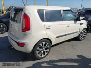 2013 Kia Soul + with VIN KNDJT2A6XD7760122, listed as a IAAI auction lot 41652106 with 116,237 mi miles. Bid and sale history available at carsss.com. Image 4.