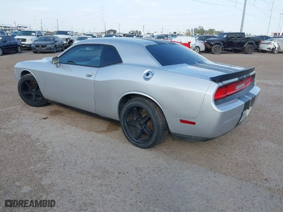 2012 Dodge Challenger SXT Plus with VIN 2C3CDYAG9CH104972, listed as a IAAI auction lot 41738042 with 148,794 mi miles. Bid and sale history available at carsss.com. Image 3.