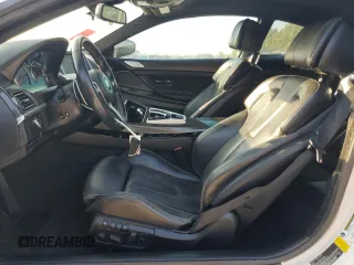 2014 BMW M6 z VIN WBSLX9C51ED160143, wystawiony jako Copart lot #73044214 z przebiegiem 91 717 mil mil oraz Szkoda całkowita • Salvage title. Historia ofert i sprzedaży dostępna na DreamBid. Obrazek 7.
