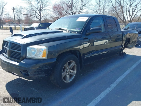 2007 Dodge Dakota SLT z VIN 1D7HW48JX7S196121, wystawiony jako IAAI lot #41863734 z przebiegiem 148 720 mil mil oraz . Historia ofert i sprzedaży dostępna na DreamBid. Obrazek 17.