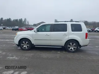 2013 Honda Pilot Touring with VIN 5FNYF4H95DB011661, listed as a IAAI auction lot 42101104 with 298,004 mi miles and . Bid and sale history available at carsss.com. Image 14.