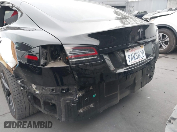 2022 Tesla Model S with VIN 5YJSA1E55NF474342, listed as a IAAI auction lot 41870994 with 33,804 mi miles and . Bid and sale history available at DreamBid. Image 6.