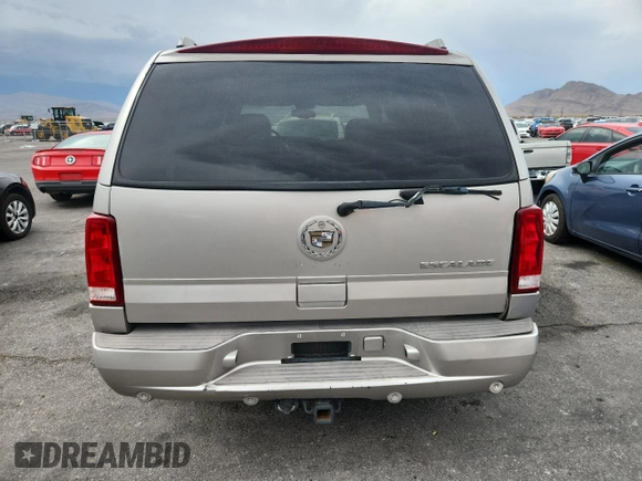 2004 Cadillac Escalade z VIN 1GYEC63T64R285823, wystawiony jako Copart lot #59167915 z przebiegiem 289 955 mil mil oraz Szkoda całkowita • Salvage title. Historia ofert i sprzedaży dostępna na DreamBid. Obrazek 6.