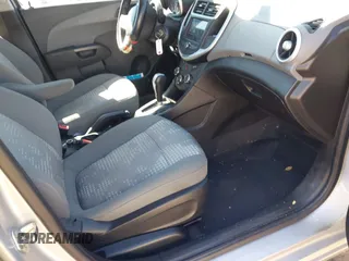 2018 Chevrolet Sonic LS with VIN 1G1JB5SH2J4112817, listed as a IAAI auction lot 41620486 with 60,479 mi miles and . Bid and sale history available at DreamBid. Image 5.