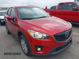 2015 Mazda CX-5 Touring with VIN JM3KE4CYXF0439953, listed as a IAAI auction lot 42124197 with 242,614 mi miles and . Bid and sale history available at DreamBid. Image 1.