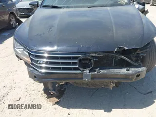 2018 Volkswagen Passat S z VIN 1VWAA7A39JC006444, wystawiony jako IAAI lot #42233008 z przebiegiem 136 828 mil mil oraz . Historia ofert i sprzedaży dostępna na DreamBid. Obrazek 6.