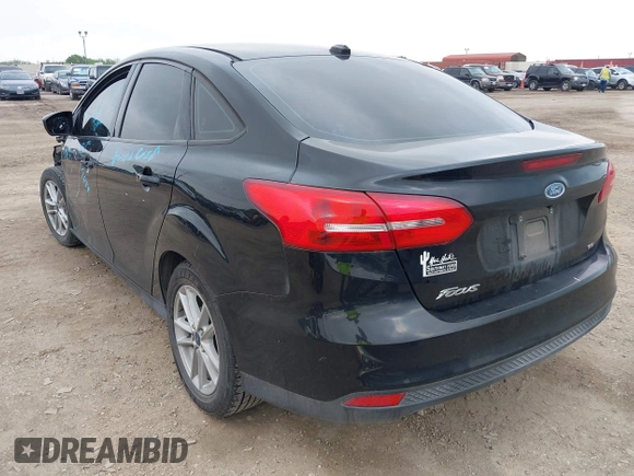 2018 Ford Focus SE with VIN 1FADP3F28JL302634, listed as a IAAI auction lot 42103219 with 71,682 mi miles and . Bid and sale history available at DreamBid. Image 3.