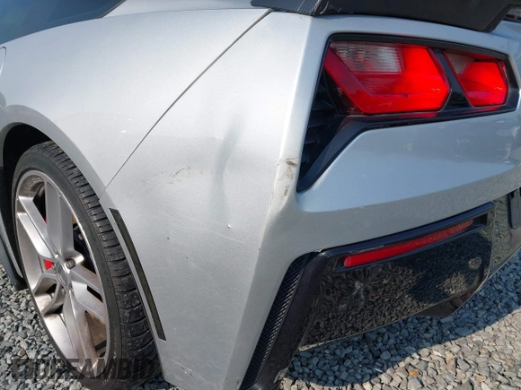 2015 Chevrolet Corvette 3LT with VIN 1G1YF2D7XF5113771, listed as a IAAI auction lot 42555790 with 83,467 mi miles and . Bid and sale history available at DreamBid. Image 18.