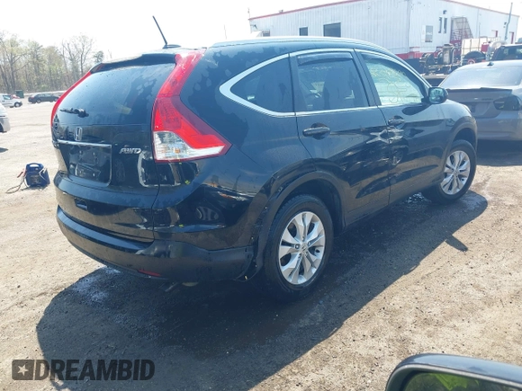 2014 Honda CR-V EX-L with VIN 2HKRM4H76EH673891, listed as a IAAI auction lot 42009693 with 103,798 mi miles. Bid and sale history available at carsss.com. Image 4.