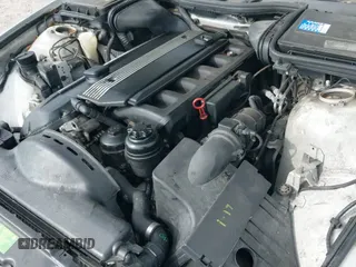 2000 BMW 5 Series 528i with VIN WBADM6344YGU22084, listed as a IAAI auction lot 41734099 with 249,650 mi miles and . Bid and sale history available at DreamBid. Image 12.