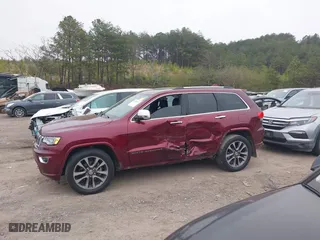 2017 Jeep Grand Cherokee Overland with VIN 1C4RJECG6HC719001, listed as a IAAI auction lot 41795517 with 103,076 mi miles. Bid and sale history available at carsss.com. Image 6.