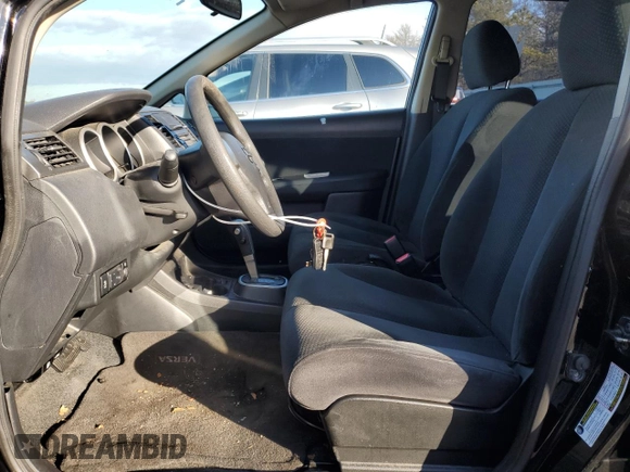 2012 Nissan Versa S with VIN 3N1BC1CPXCK241563, listed as a Copart auction lot 44239995 with 107,762 mi miles and Clean Title. Bid and sale history available at DreamBid. Image 7.