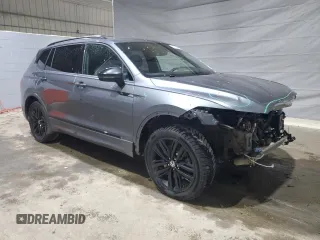 2022 Volkswagen Tiguan SE R-Line Black with VIN 3VV8B7AX6NM026562, listed as a Copart auction lot 57569015 with 115,478 mi miles and Salvage title. Bid and sale history available at DreamBid. Image 4.