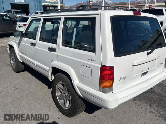 2000 Jeep Cherokee Classic with VIN 1J4FF58S4YL219673, listed as a Copart auction lot 48809075 with 198,334 mi miles and Salvage Title. Bid and sale history available at carsss.com. Image 3.