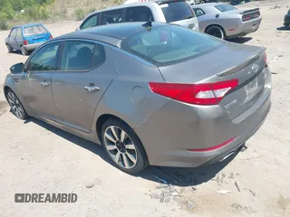 2012 Kia Optima SX z VIN 5XXGR4A64CG031334, wystawiony jako IAAI lot #42045187 z przebiegiem 251 069 mil mil oraz . Historia ofert i sprzedaży dostępna na DreamBid. Obrazek 3.