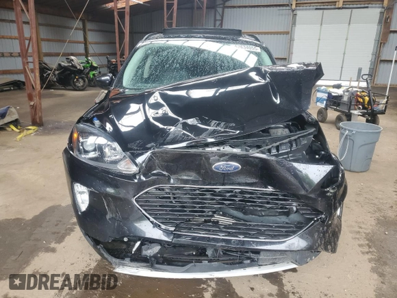 2021 Ford Escape SEL с VIN 1FMCU9H61MUA41424, выставлен на аукционе Copart как лот 57634055 с пробегом 145 286 миль миль и Списание • Salvage title. История ставок и продаж доступна на DreamBid. Изображение 5.