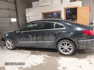 2009 Volkswagen CC Luxury z VIN WVWHL73C09E515699, wystawiony jako IAAI lot #41596349 z przebiegiem 143 570 mil mil oraz . Historia ofert i sprzedaży dostępna na DreamBid. Obrazek 15.