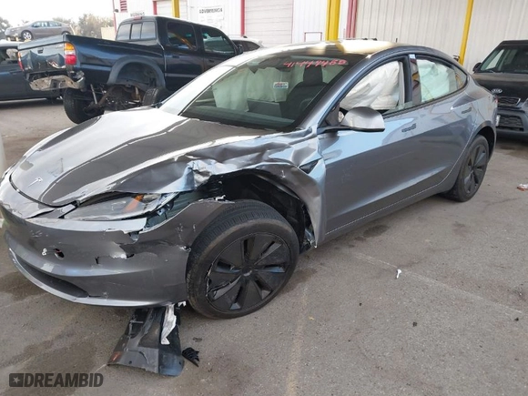 2025 Tesla Model 3 Long Range with VIN 5YJ3E1EBXSF912475, listed as a IAAI auction lot 41449488 with 3,100 mi miles. Bid and sale history available at carsss.com. Image 2.