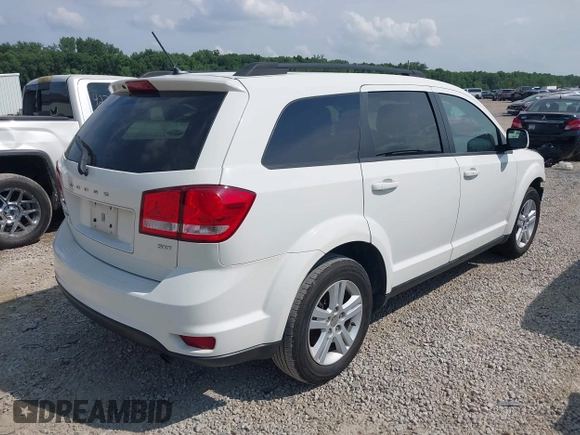2012 Dodge Journey SXT z VIN 3C4PDCBB0CT323569, wystawiony jako IAAI lot #42748440 z przebiegiem 141 950 mil mil oraz . Historia ofert i sprzedaży dostępna na DreamBid. Obrazek 4.