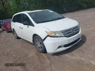 2012 Honda Odyssey EX-L with VIN 5FNRL5H63CB117341, listed as a IAAI auction lot 42197815 with 256,544 mi miles and . Bid and sale history available at DreamBid. Image 1.