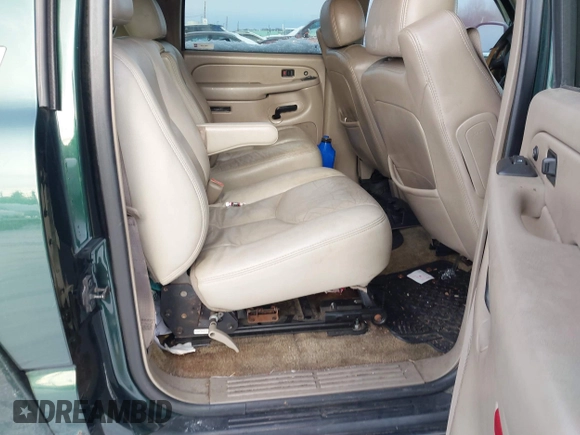 2003 Chevrolet Suburban LT z VIN 3GNFK16Z63G166885, wystawiony jako IAAI lot #41150771 z przebiegiem 290 630 mil mil oraz . Historia ofert i sprzedaży dostępna na DreamBid. Obrazek 8.