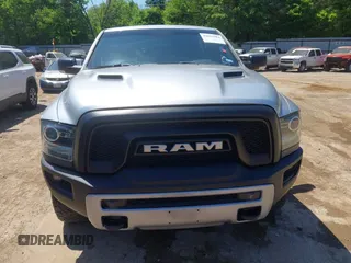 2016 Ram 1500 Rebel z VIN 1C6RR7YT7GS185173, wystawiony jako IAAI lot #42033684 z przebiegiem 152 758 mil mil oraz . Historia ofert i sprzedaży dostępna na DreamBid. Obrazek 12.