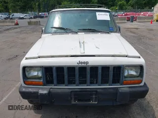 1998 Jeep Cherokee Sport z VIN 1J4FJ68SXWL243008, wystawiony jako IAAI lot #42411968 z przebiegiem 147 680 mil mil oraz . Historia ofert i sprzedaży dostępna na DreamBid. Obrazek 6.
