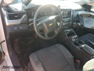 2016 Chevrolet Tahoe Commercial with VIN 1GNSKFEC2GR266027, listed as a Copart auction lot 84628234 with 135,689 mi miles and Salvage Title. Bid and sale history available at carsss.com. Image 8.