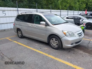 2005 Honda Odyssey EX-L with VIN 5FNRL38715B003399, listed as a IAAI auction lot 42589092 with 252,737 mi miles and . Bid and sale history available at DreamBid. Image 1.