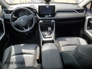 2022 Toyota RAV4 Hybrid XLE Premium with VIN 4T3B6RFV8NU101319, listed as a Copart auction lot 60987535 with 100,070 mi miles and Salvage title. Bid and sale history available at DreamBid. Image 8.