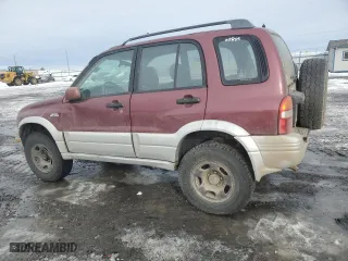 1999 Suzuki Grand Vitara JLX with VIN JS3TD62V6X4108950, listed as a Copart auction lot 46468705 with 215,541 mi miles and Salvage Title. Bid and sale history available at carsss.com. Image 2.