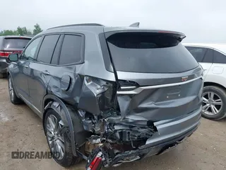 2021 Cadillac XT6 Sport with VIN 1GYKPGRS6MZ128112, listed as a IAAI auction lot 42415342 with 57,680 mi miles and . Bid and sale history available at DreamBid. Image 3.