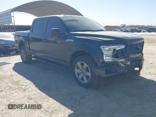 2018 Ford F-150 XL with VIN 1FTEW1E50JKE13640, listed as a IAAI auction lot 41228537 with 146,927 mi miles. Bid and sale history available at carsss.com. Image 1.